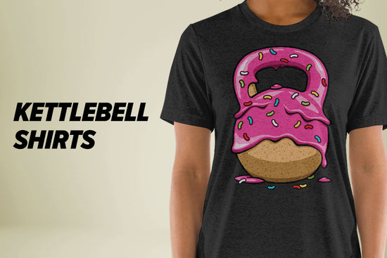 Shop Kettlebell Shirts: Model wearing black t-shirt with a pink kettlebell donut graphic on beige background.